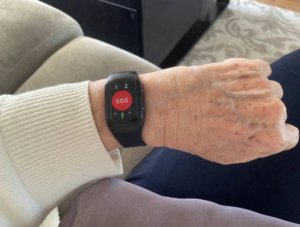 The Senlo Guardian on an older person's wrist at home